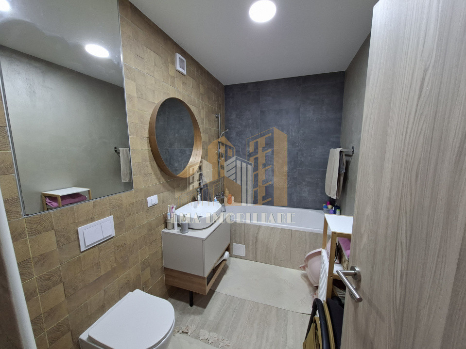 Apartament 2 camere 2 bai decomandat Complex Grandis Tractoru Brasov